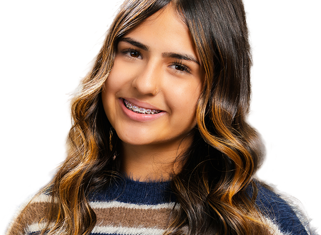 a photo of a teen wearing braces
