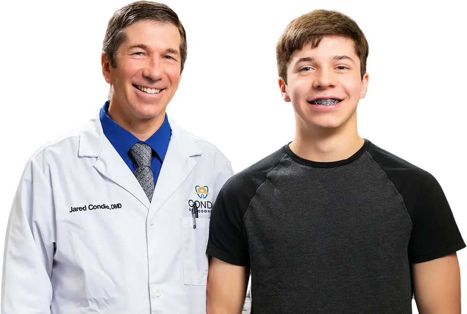 Dr. Condie with teen patient orthodontic services