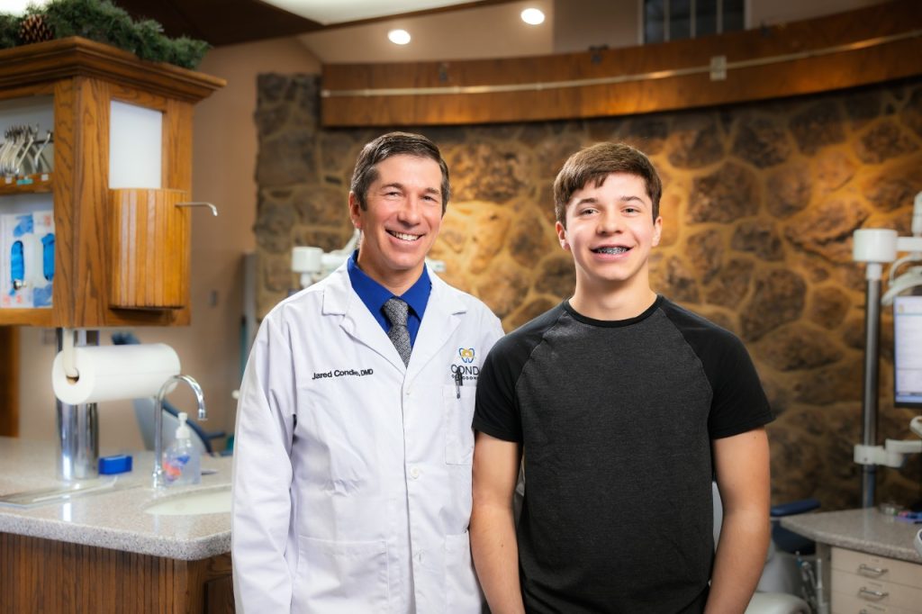 Dr. Condie with teen patient