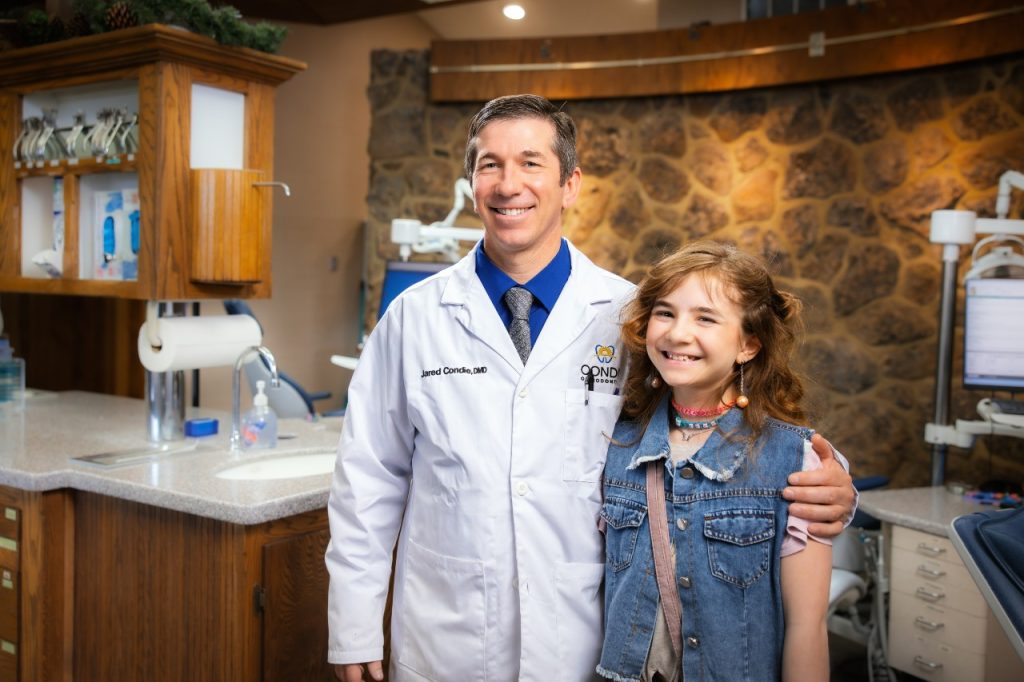Dr. Condie with child patient